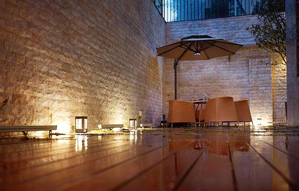 Outdoor solar lights illuminate a patio with warm glow.