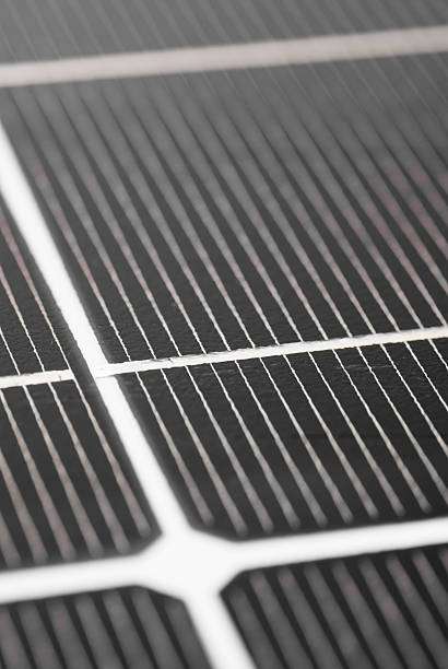 Close-up of a solar panel surface, capturing sunlight for power.