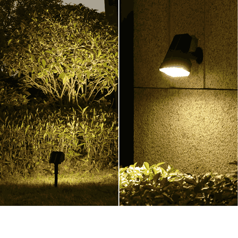 Outdoor solar light illuminates garden bushes and wall at night.
